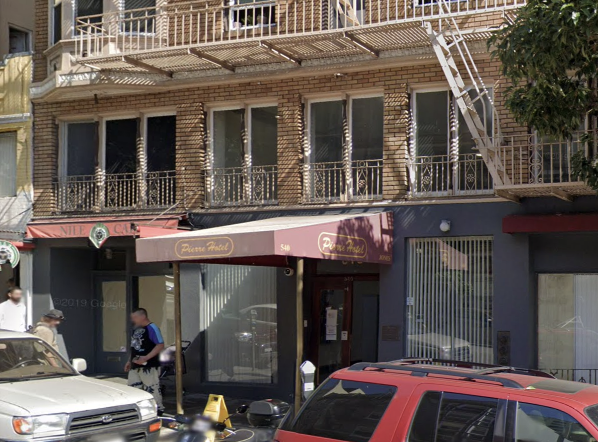 A generic square placeholder image with rounded corners in a figure.