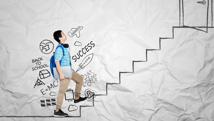 A child walking up the stairs